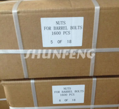 Several boxed containing hex nuts are bounded with pieces of white plastic belts for easy transportation.